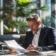 a dynamic office environment featuring a focused entrepreneur reviewing a strategic business plan for a pharmaceutical franchise, with modern technology and sleek furnishings highlighting the professional atmosphere.